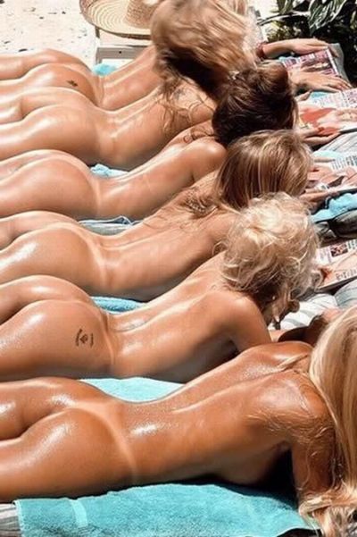 A long line of bare oiled asses