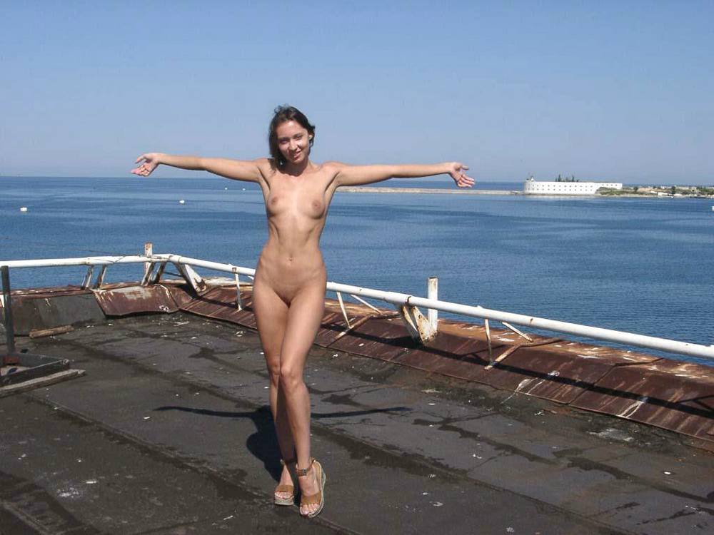 Happy girl enjoying nude a great day