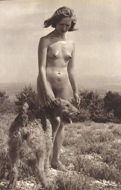 Vintage picture with a nude lady and her dog