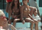 Happy topless babes at the pool