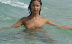875-She-expose-her-perky-nipple-while-swimming.jpg