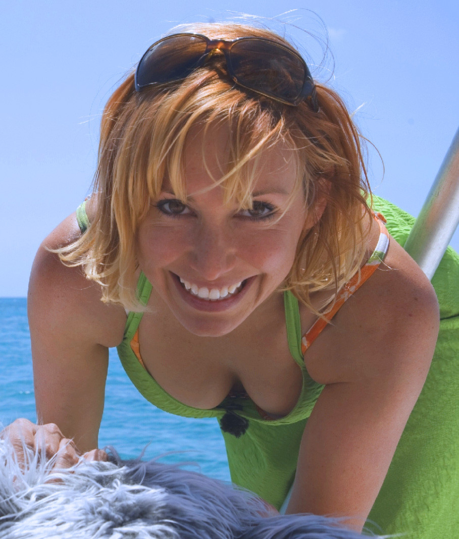 Blonde flashing cleavage on a boat