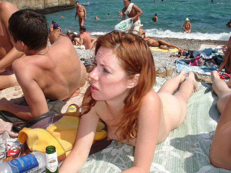 Redhead beauty nude tanning