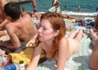 Redhead beauty nude tanning