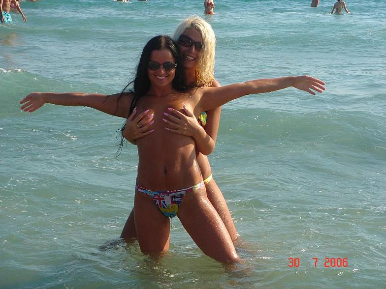 Naughty girls have fun in the warm water