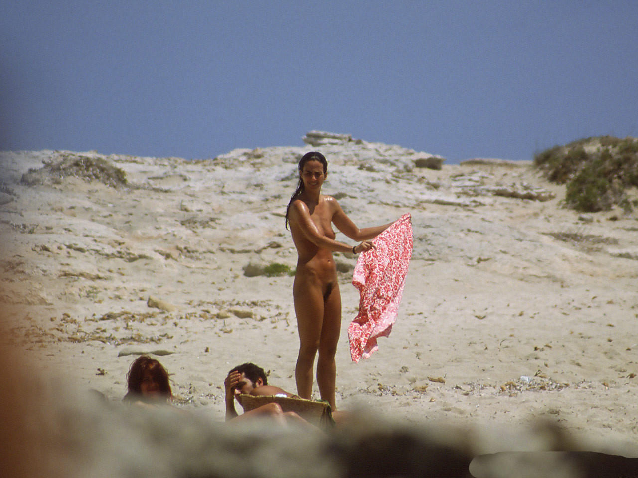 Nude on the beach and my cam caught her