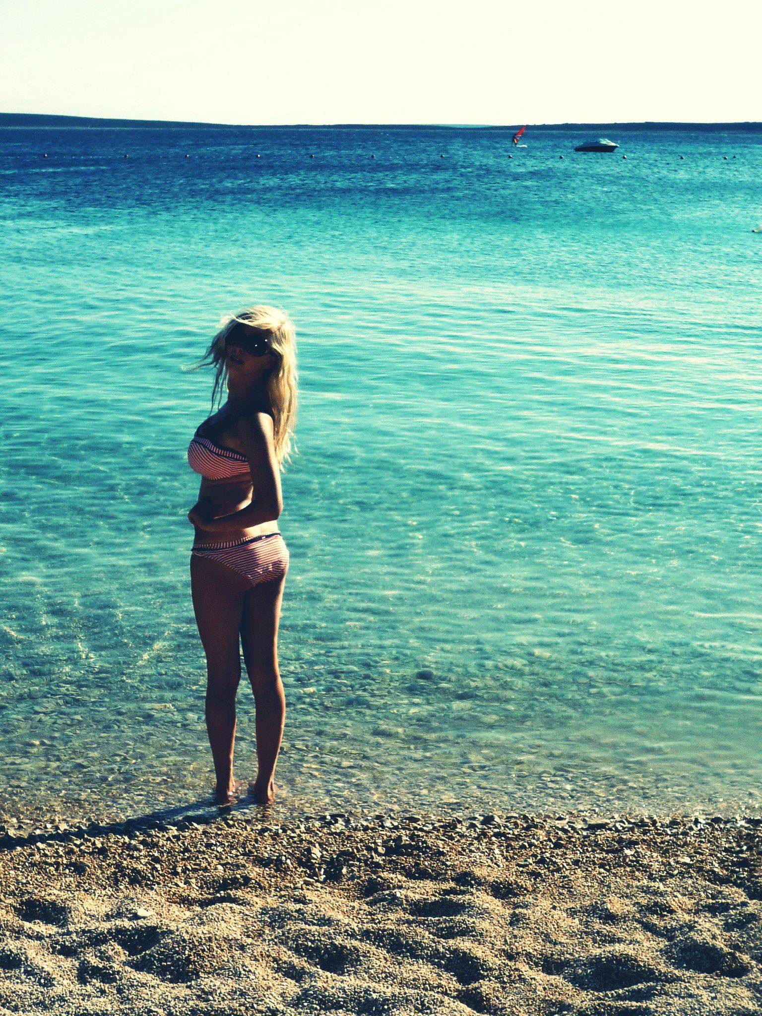 Sexy woman posing in the ocean