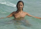 She expose her perky nipple while swimming