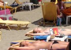 Sweet topless girls catching the sun