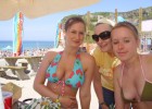 Three cuties taking candid beach pics